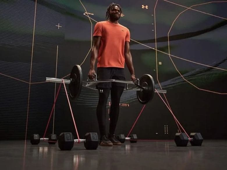 Studio set with lighting rig, barbell and dumbbells built for Under Armour, styled by Kadu Lennox